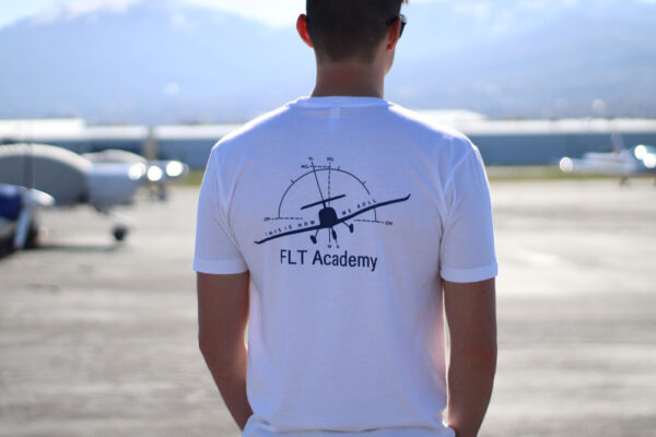 white FLT shirt with plane on back